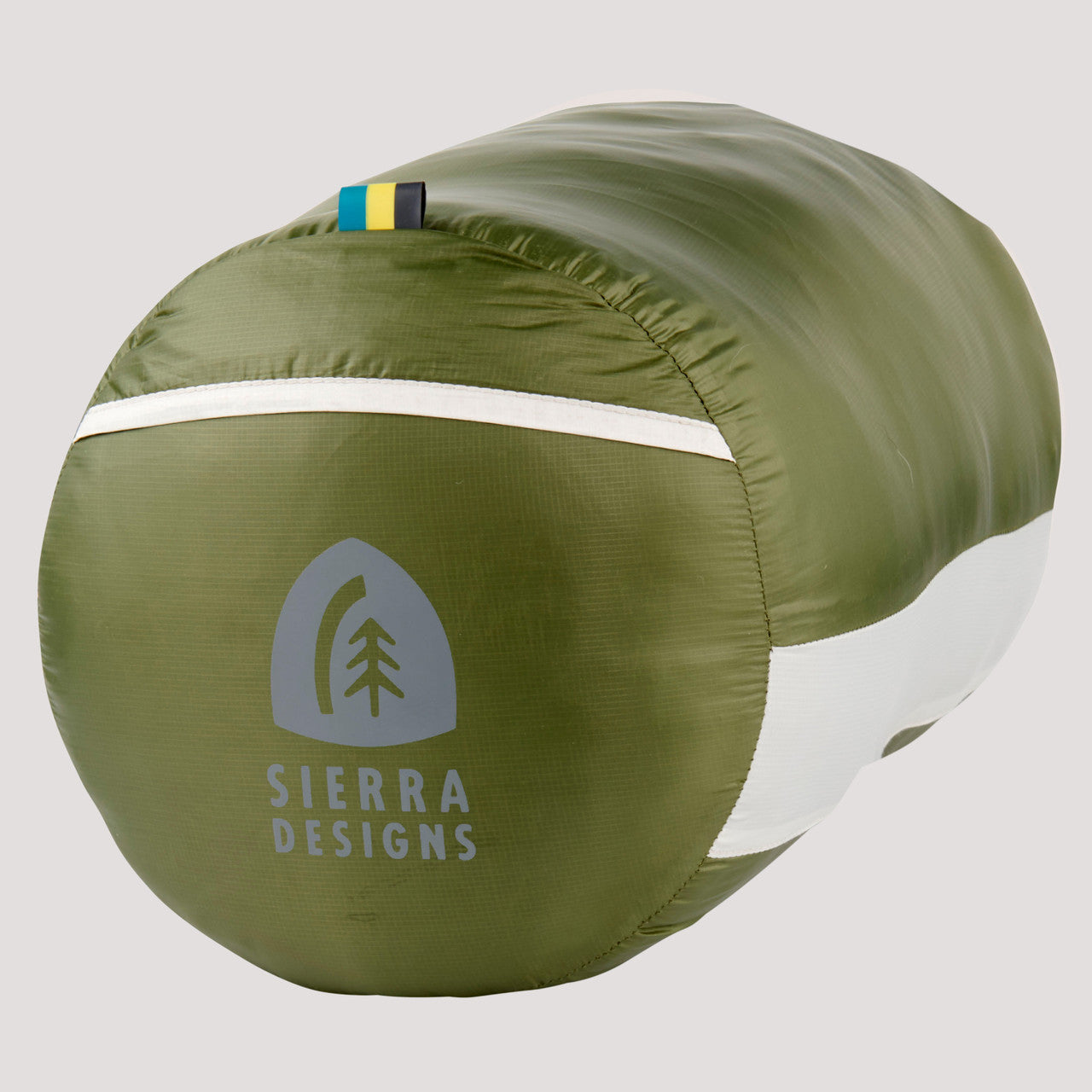 Sierra Designs Shut Eye 20 sleeping bag, shown packed inside nylon stuff sack